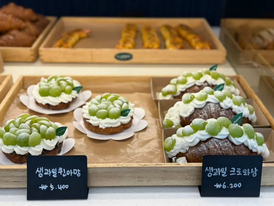 Fresh fruit croissant and kouign-amann on display