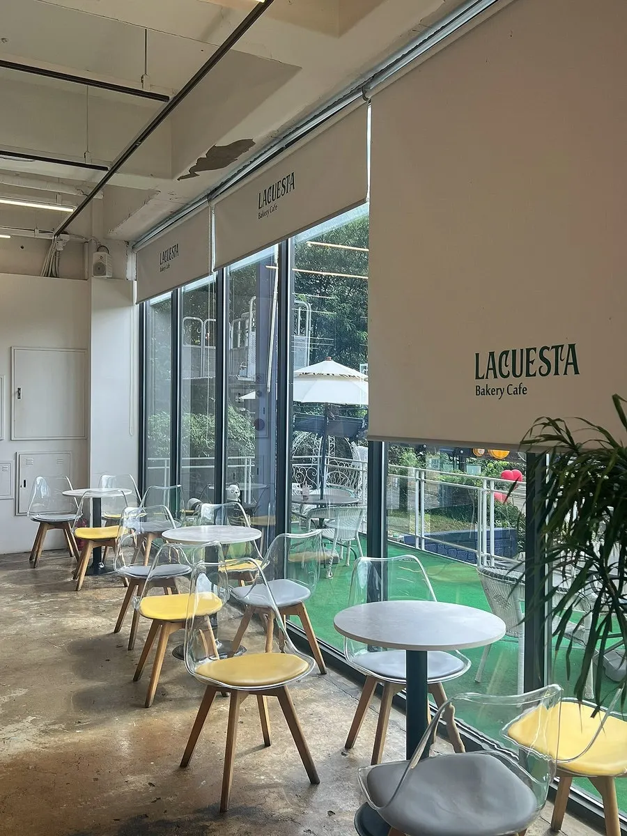 Varied seating areas across the two-story café