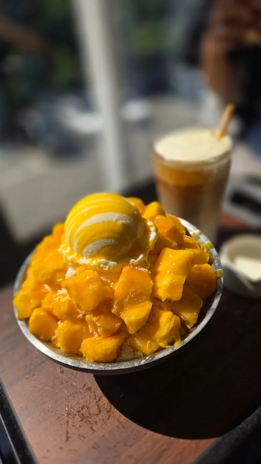 Bread enjoyed alongside mango bingsu