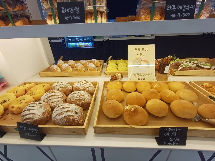 Display of red bean bread, mocha roll, and rice castella