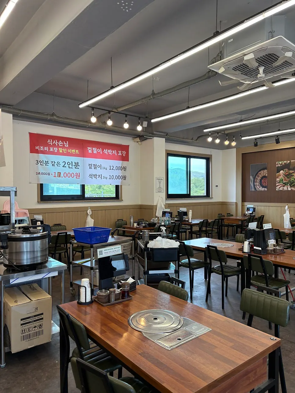 Interior with tables arranged with comfortable spacing
