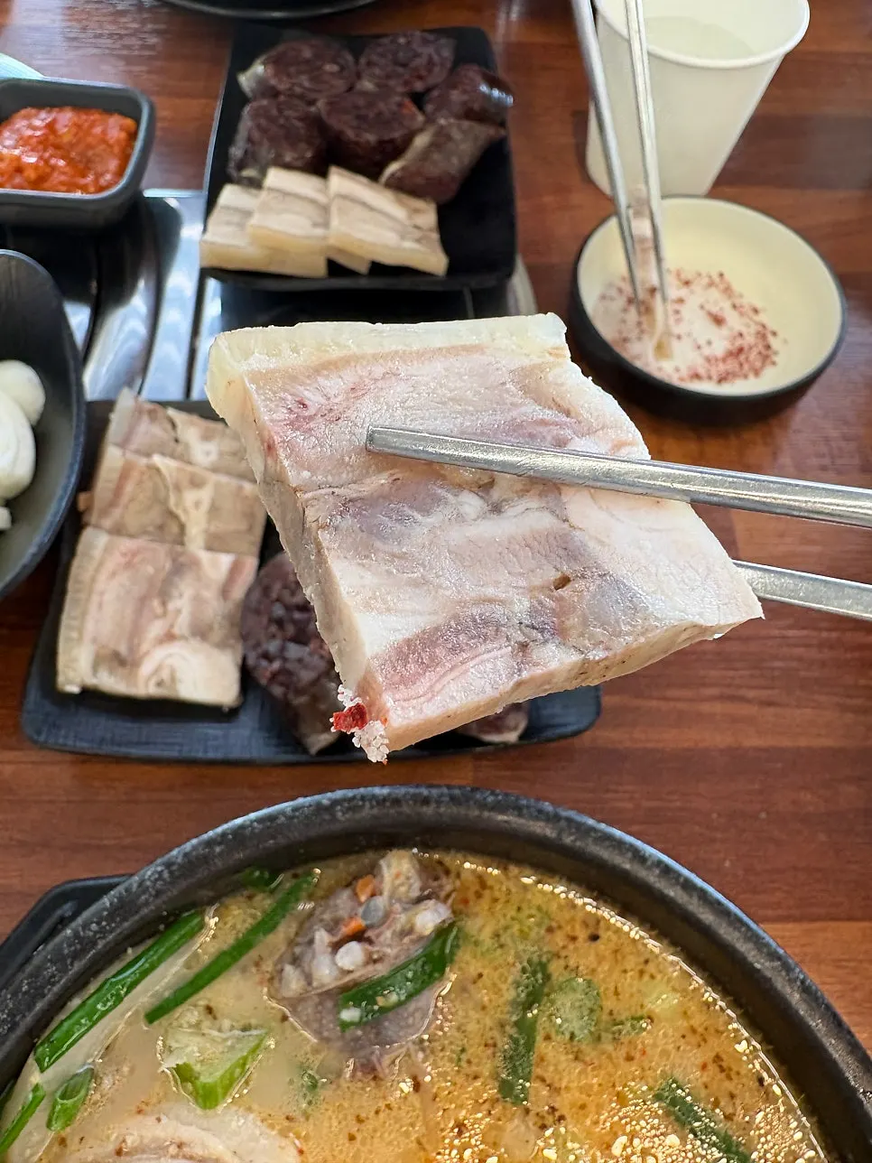 Sliced boiled pork and sweet rice sausage served with the set