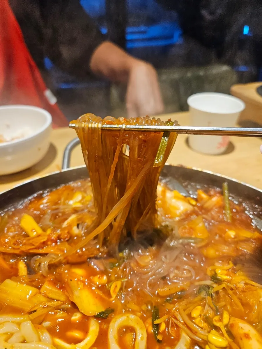 Glass noodles and udon noodles infused with sauce