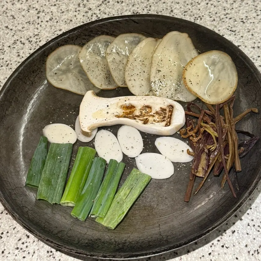Vegetables placed on the grill first