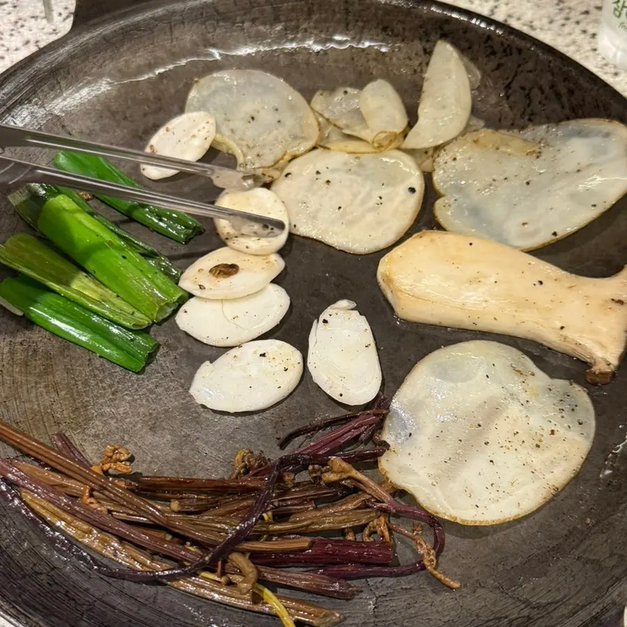 Vegetables cooking on the grill