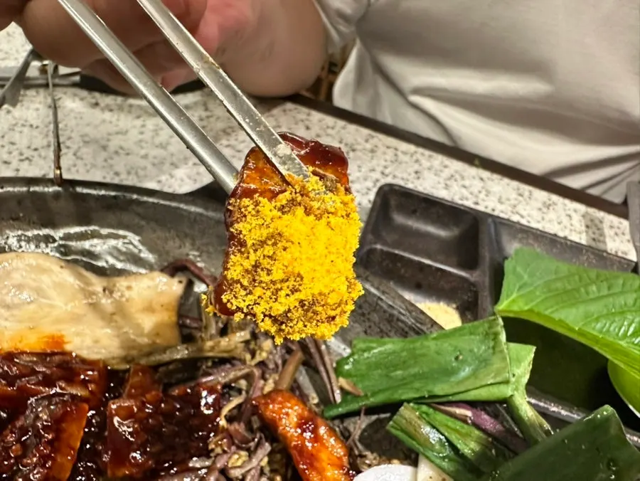 Close-up of golden-grilled seasoned pork belly