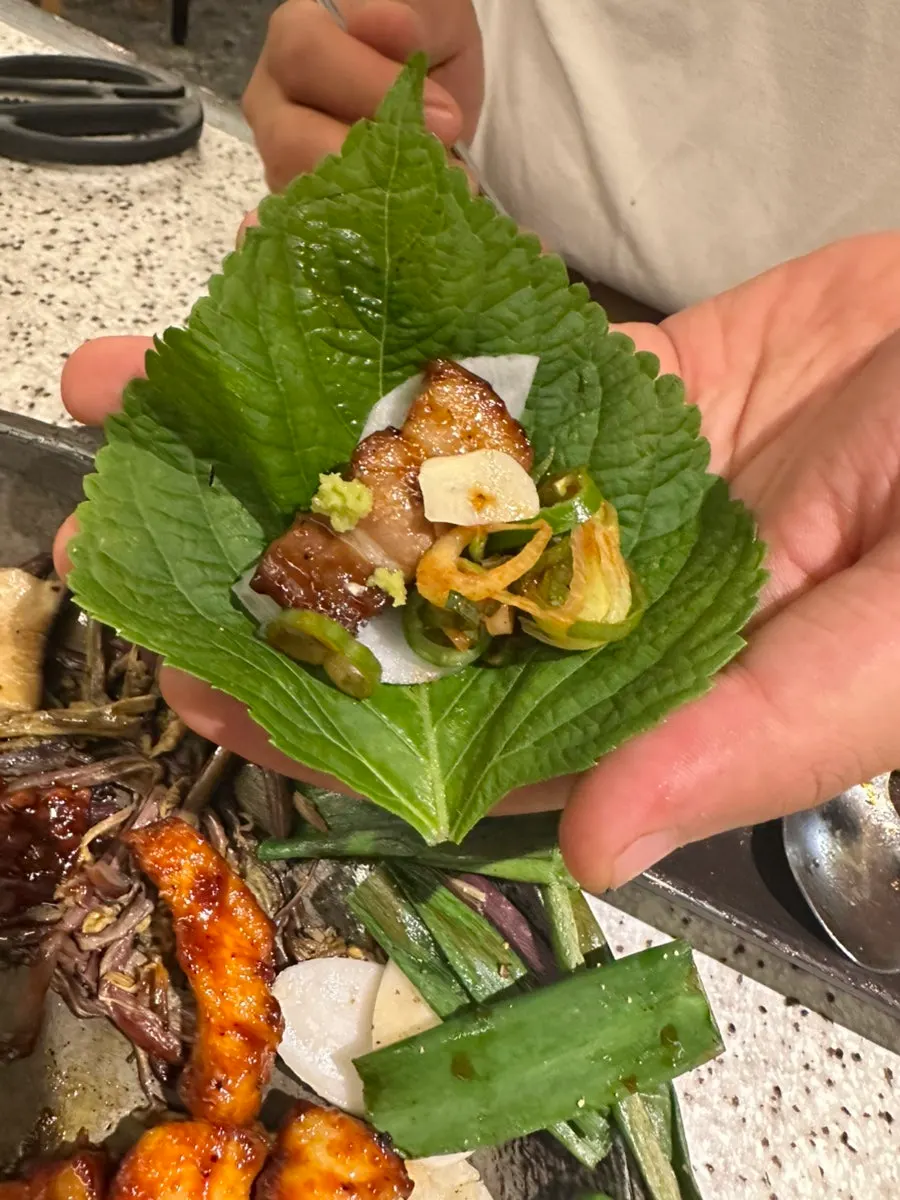 Potato wrap combined with pork belly and wasabi
