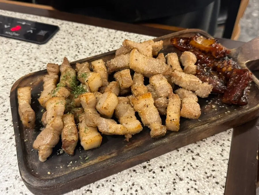 Pork belly grilled in the kitchen and brought to the table