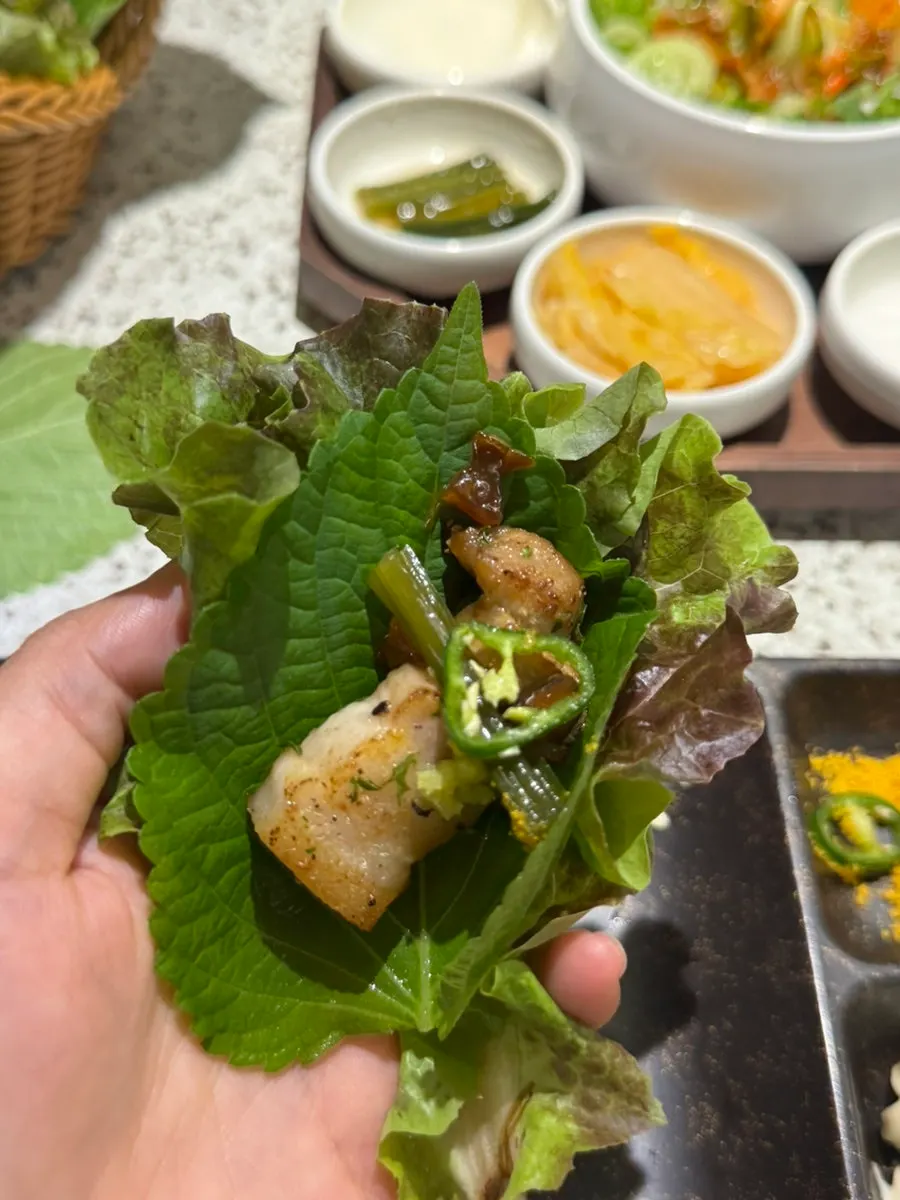 A wrap filled with grilled meat