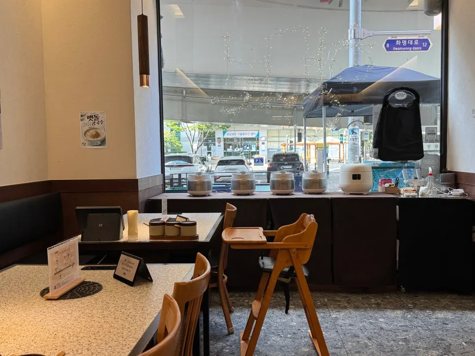 Seating with comfortable table spacing at Go Ok-hui