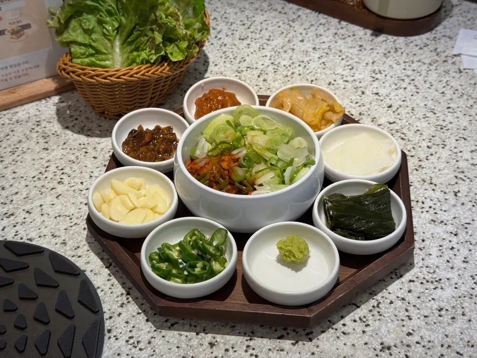 Table spread with doenjang jjigae and soju