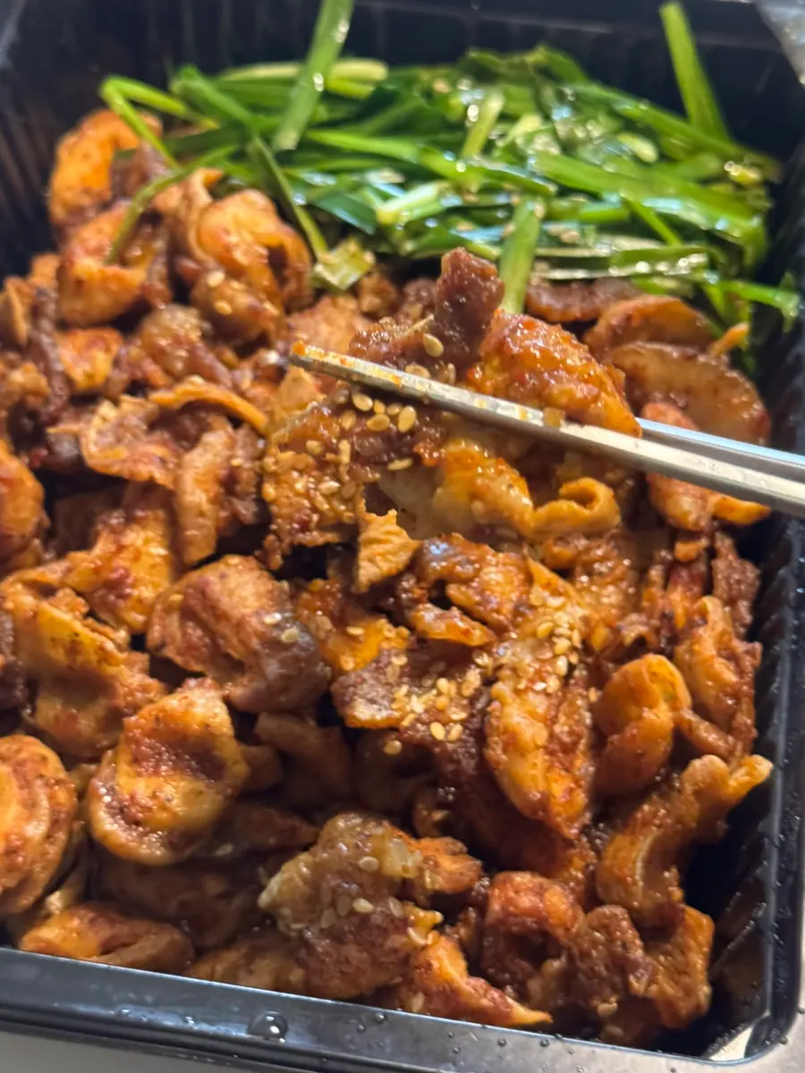 Red-sauced charcoal-grilled gopchang with char marks