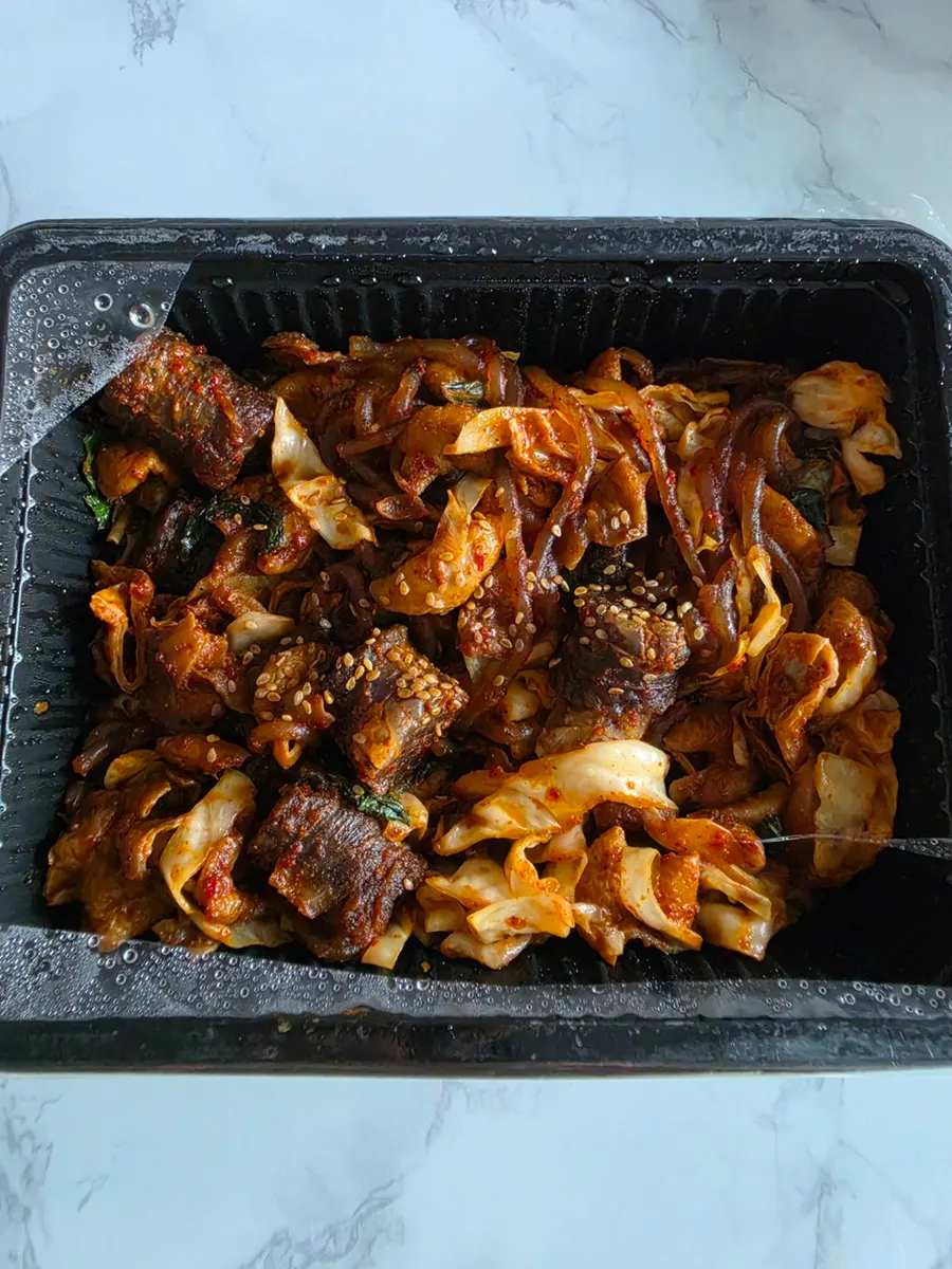 Gopchang, sundae and sauces packed separately for takeout