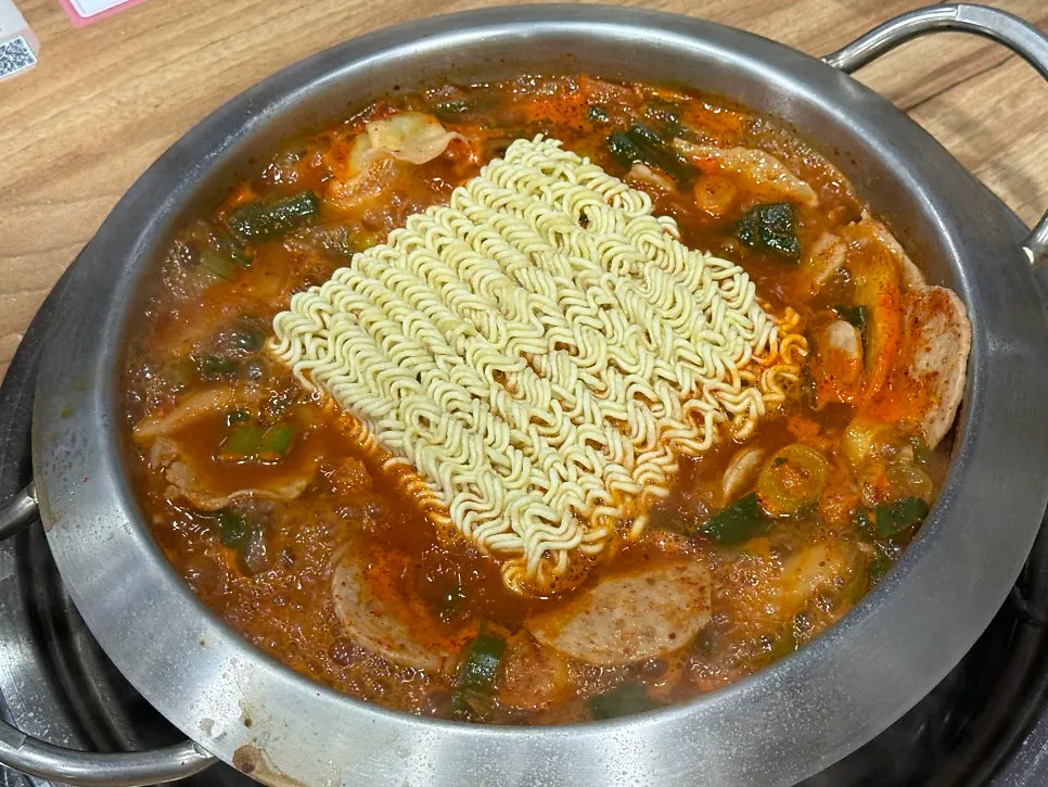 Handmade ham and sausage scooped from the budae jjigae