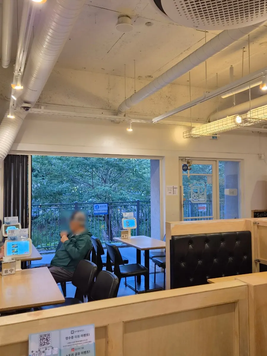 Interior and menu board at Gorae Byeoljang Suji Branch