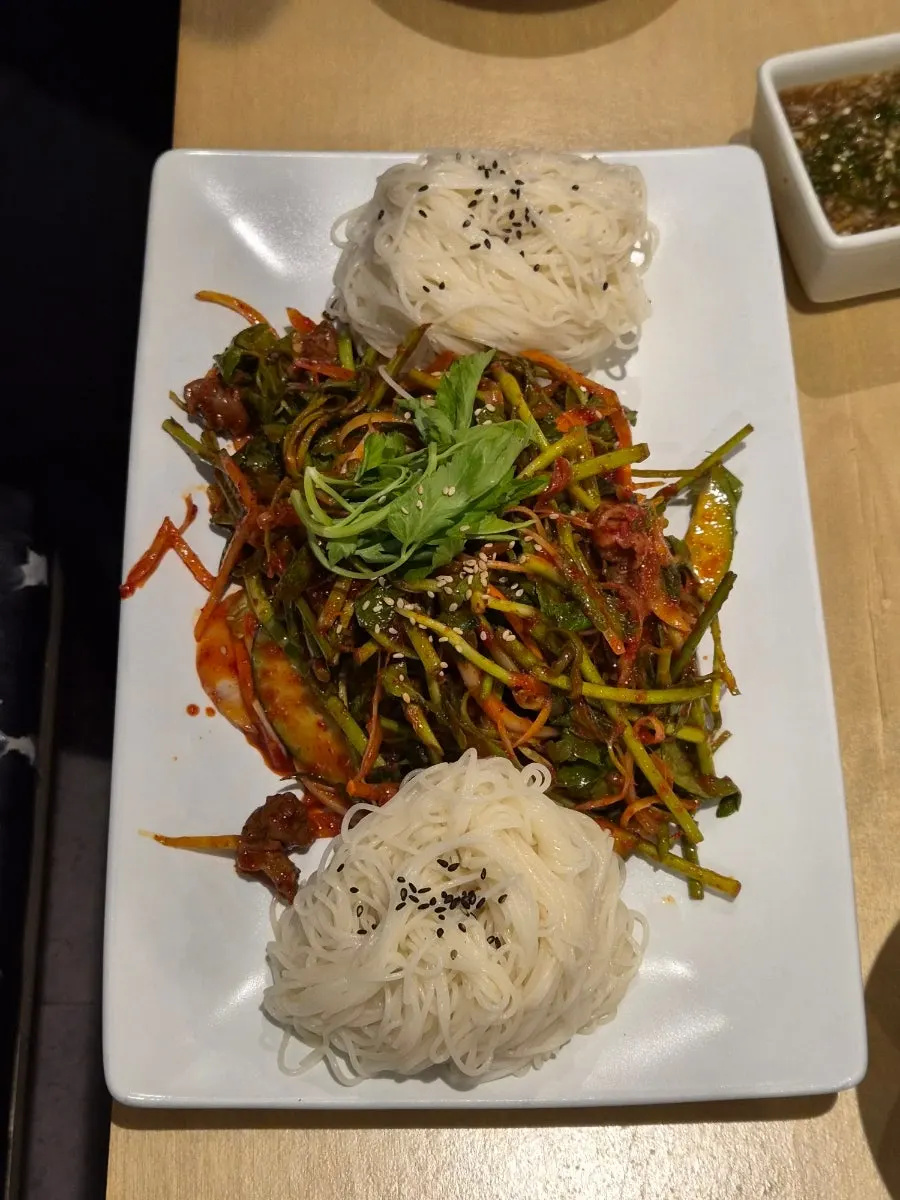 Whelk salad served with minari and somyeon noodles