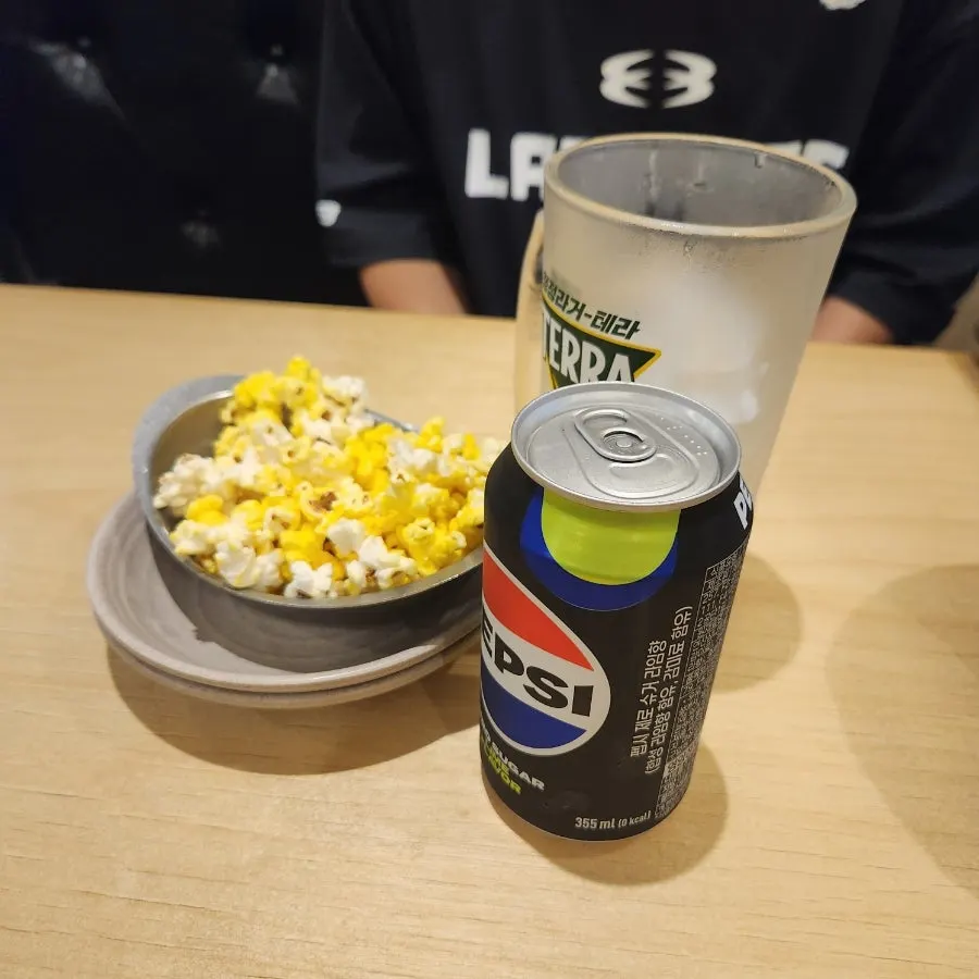 Zero-sugar cola and complimentary popcorn side