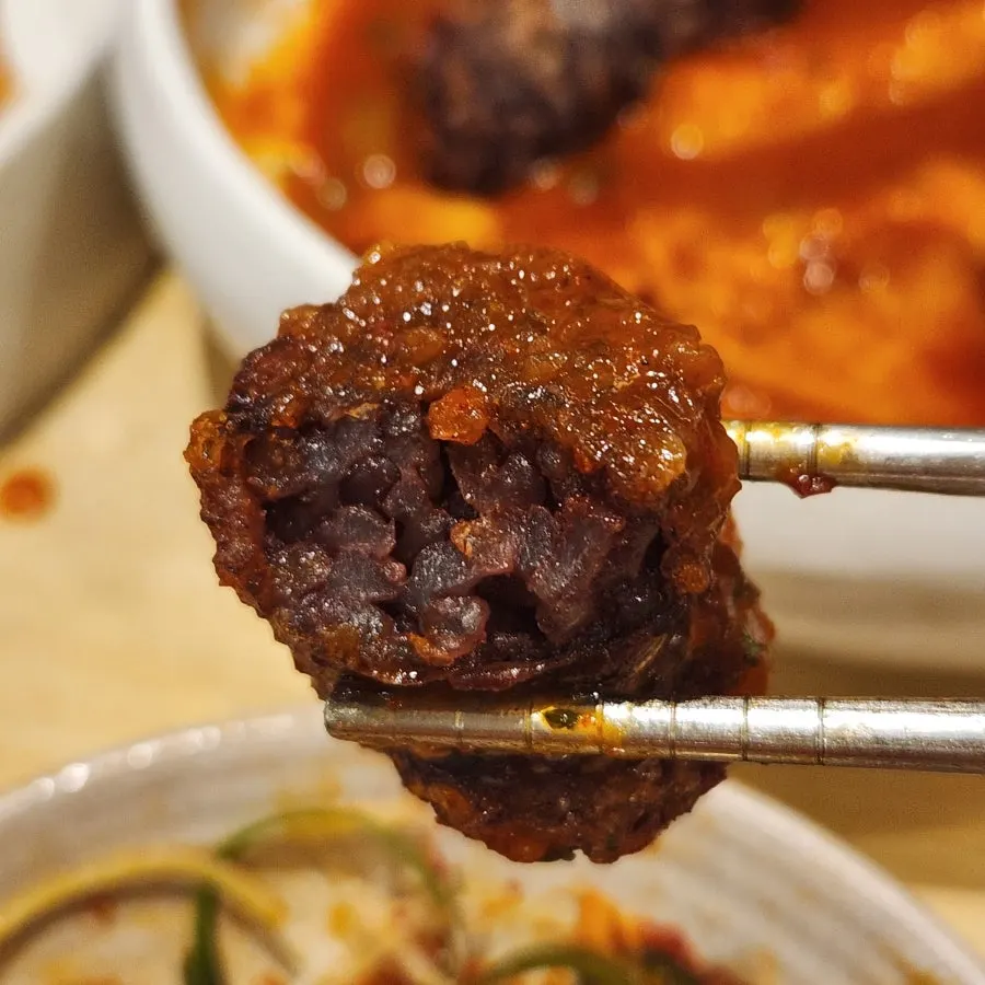 Close-up of fried sundae on top of the tteokbokki