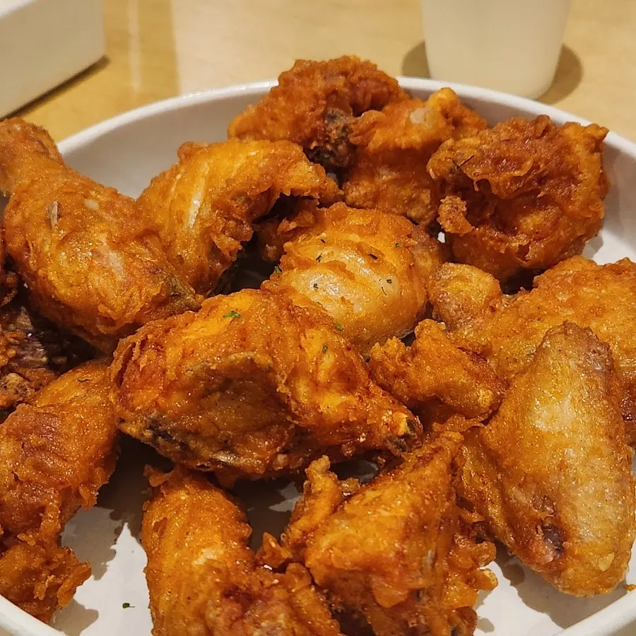 Thin, crispy-battered fried chicken