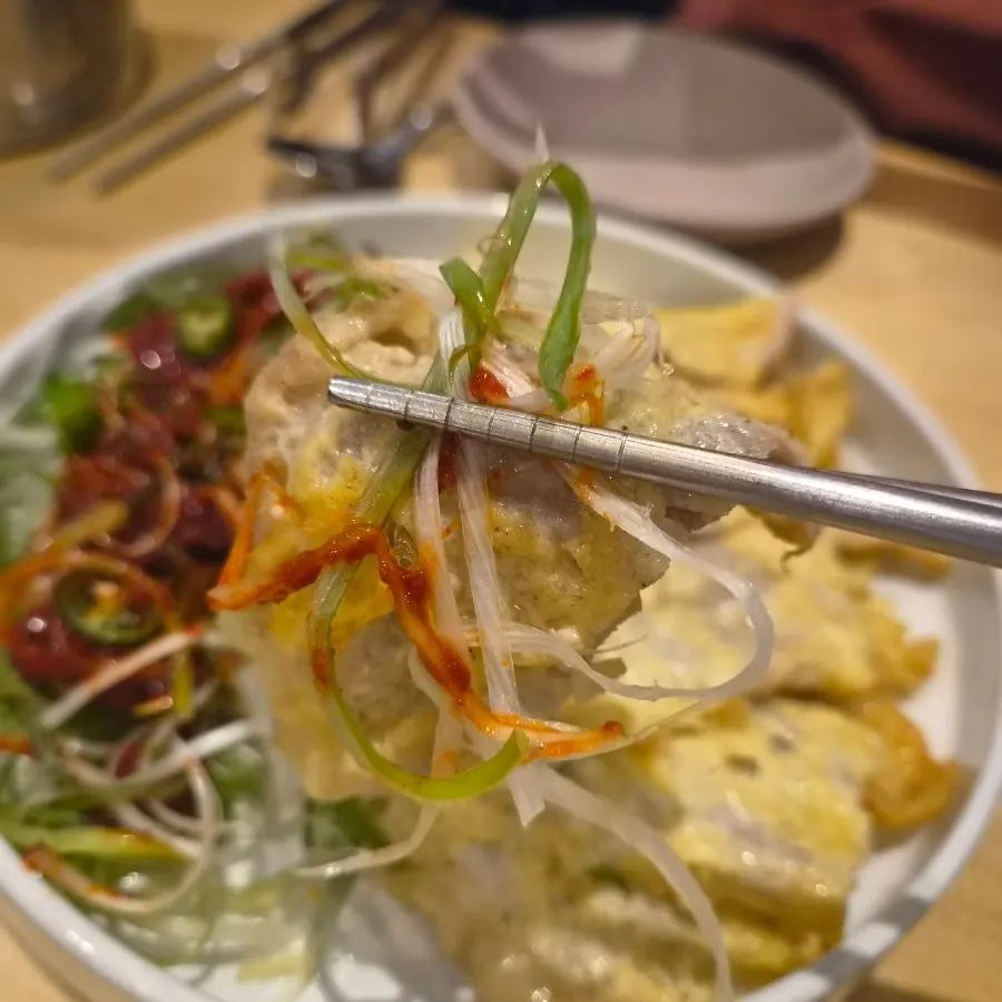 Jeonju-style pork yukjeon with scallion salad