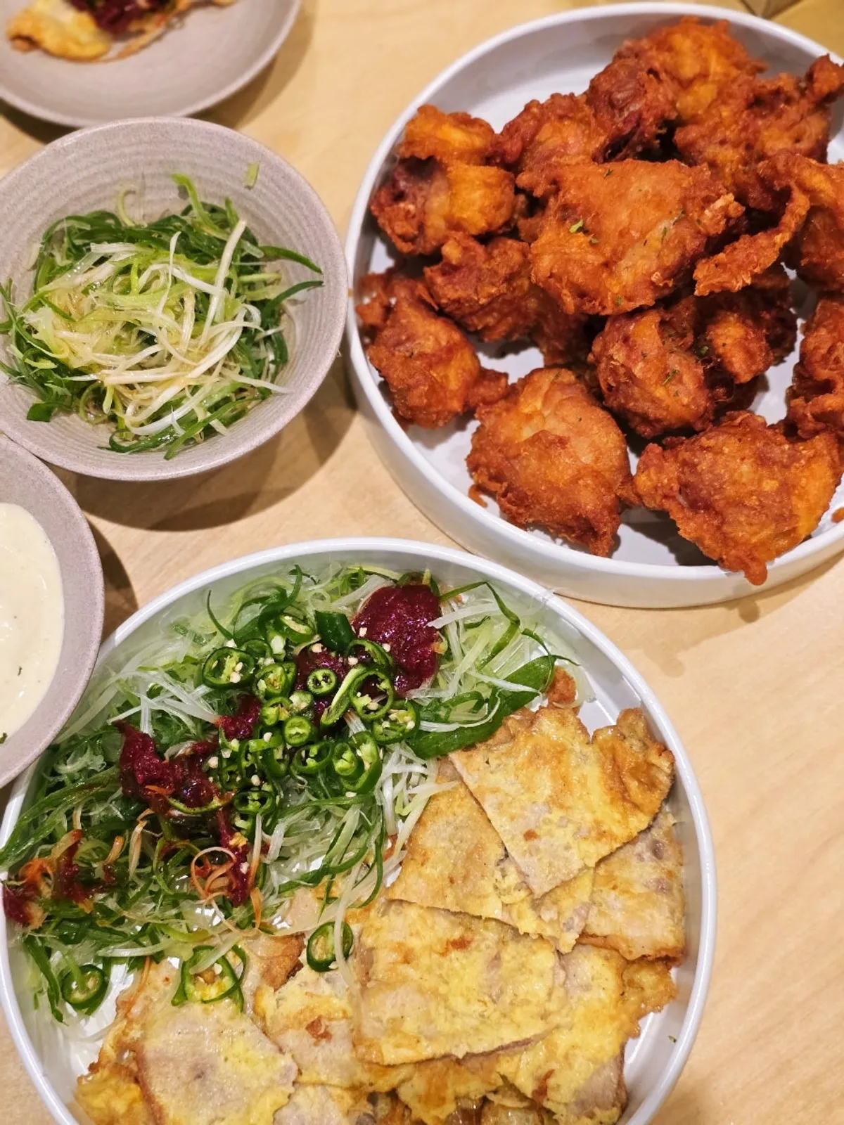 Table set with boneless chicken and pork jeon