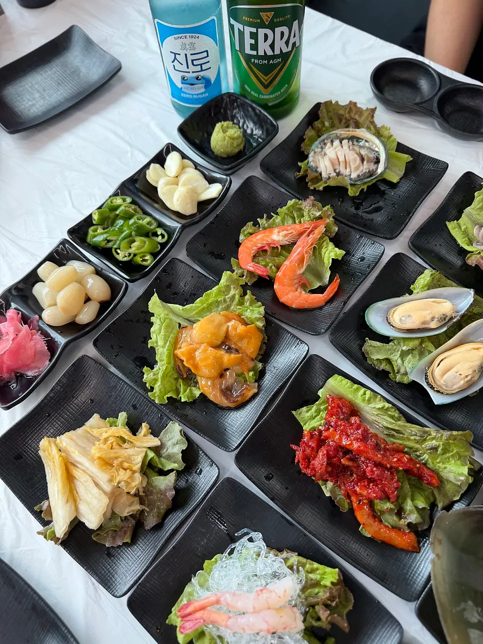 Generous basic seafood side dish spread