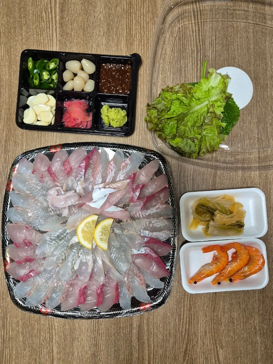 Eating Goseong takeout sashimi at Kensington Seorak Beach