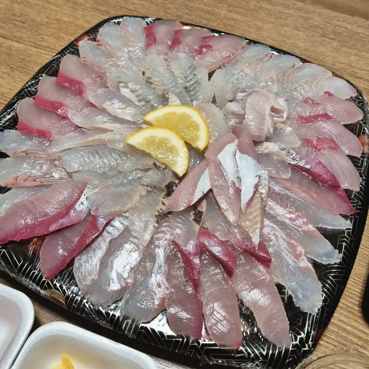 Bongpo Hoega's mixed sashimi and sides laid out at the hotel