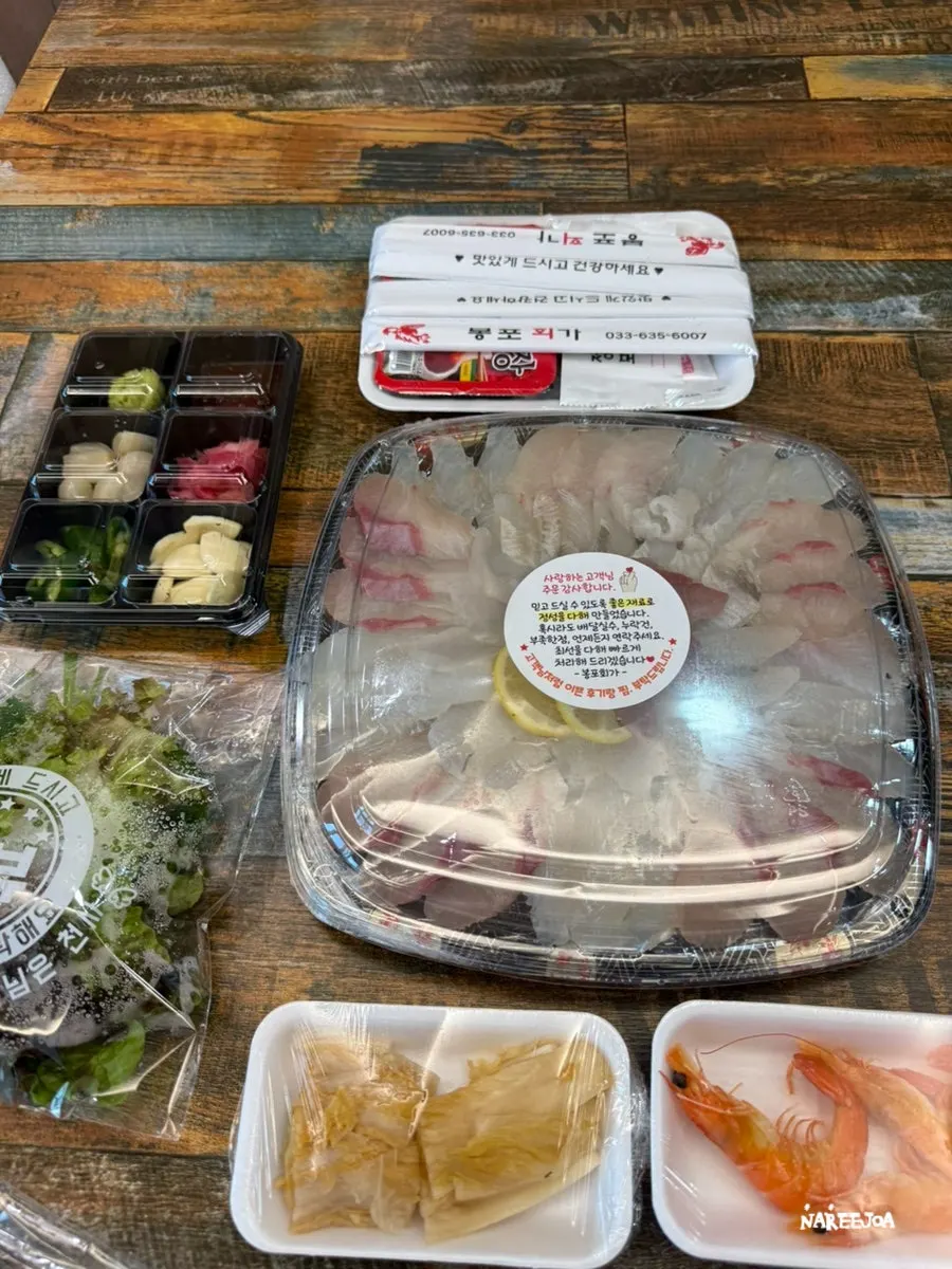 Medium mixed sashimi platter with different fish types arranged