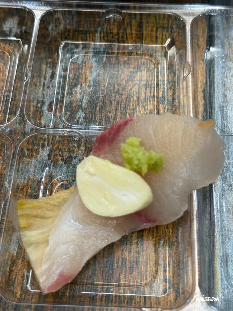 Sashimi wrapped with aged kimchi