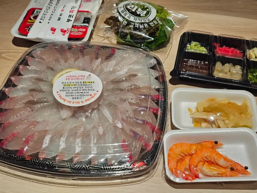 Chojang, soy sauce, wasabi, and chopsticks included with the takeout