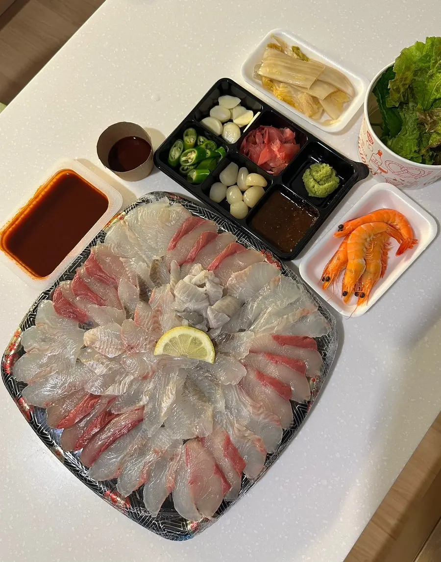 Assorted sashimi takeout packed with an ice pack