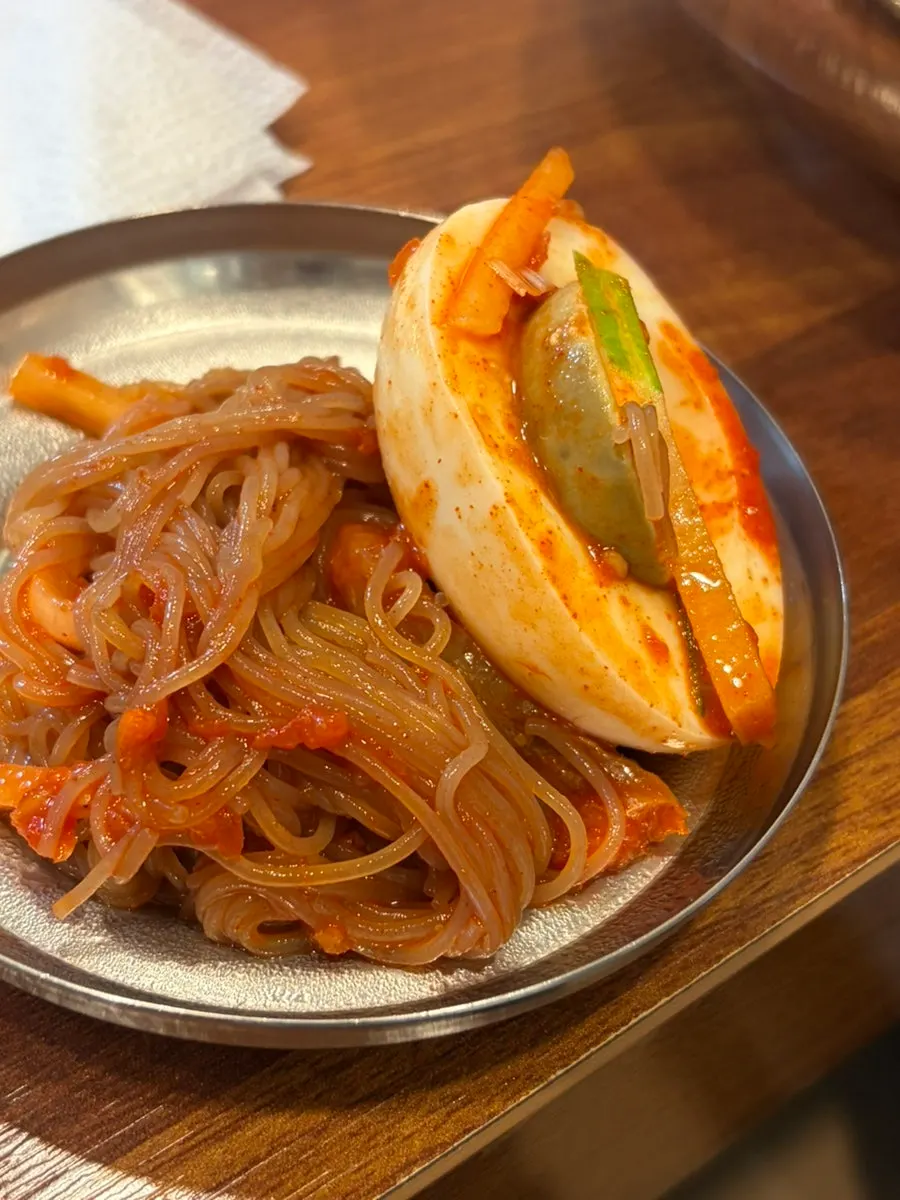 Kimchi jjigae served with a bowl of rice