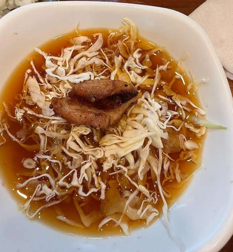 Mixed pollock hoe naengmyeon topped with pollock