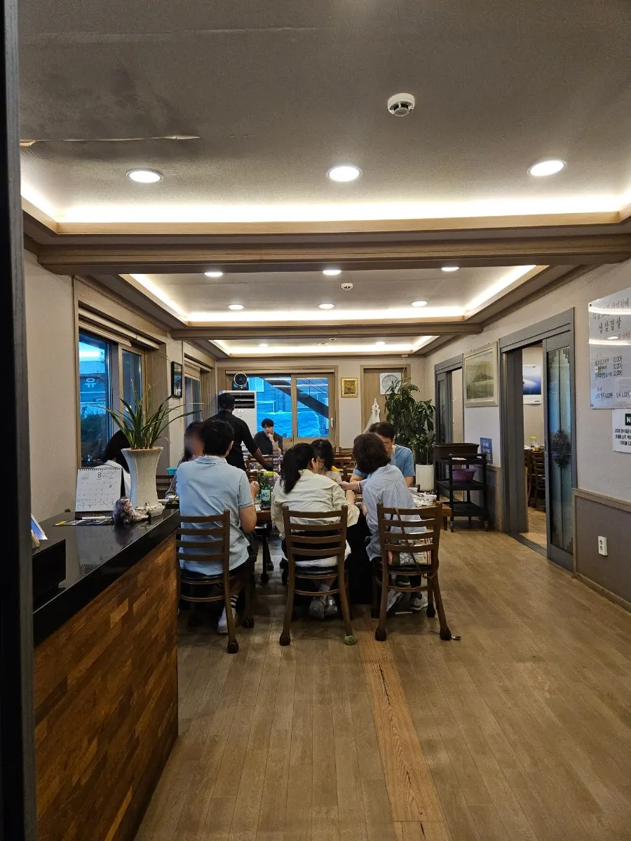 Interior tables and private room seating at Yongchon Gogi-jip