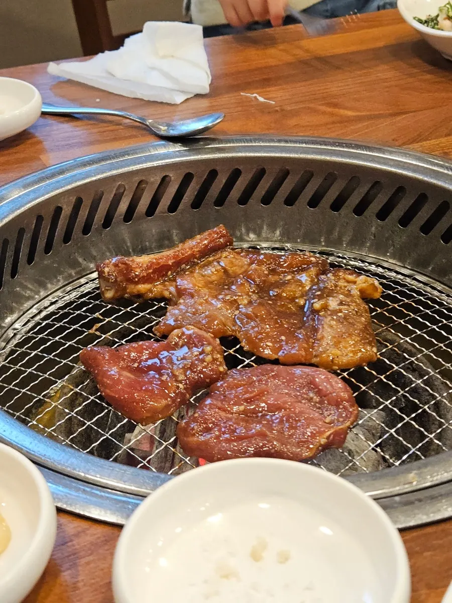 Marinated pork galbi placed on a fresh grill plate