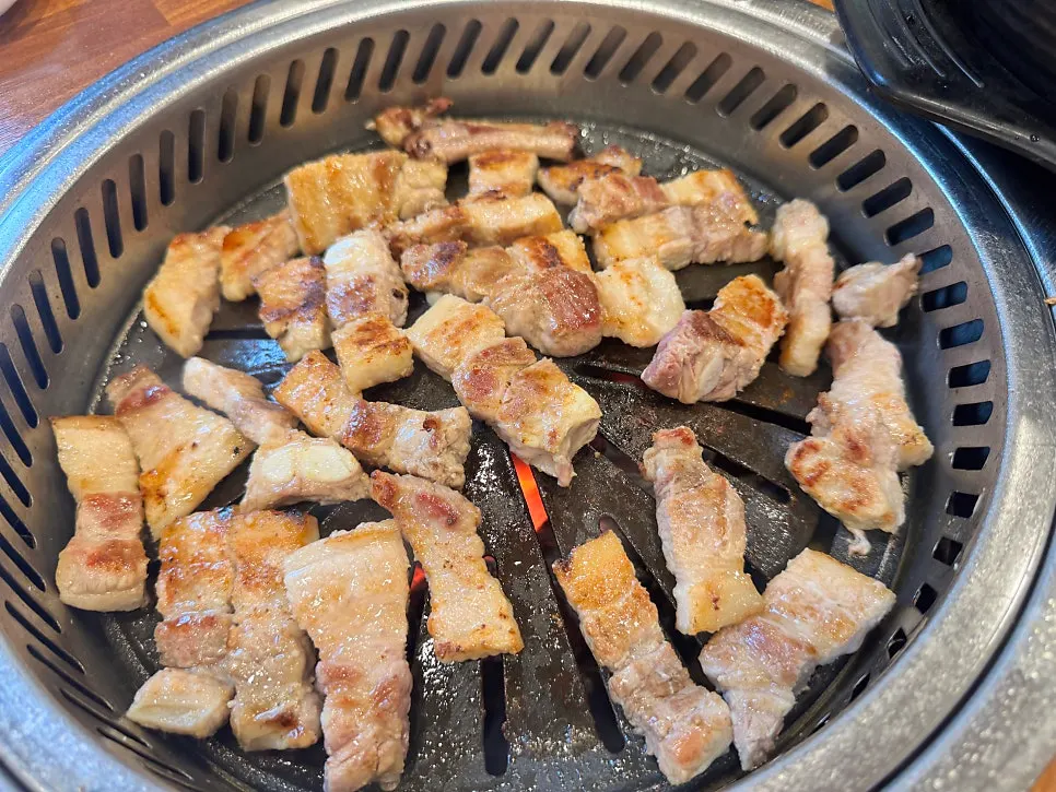 Marinated galbi cooking on the charcoal brazier