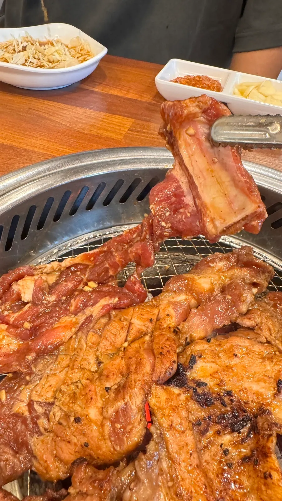 Marinated galbi placed on the grill