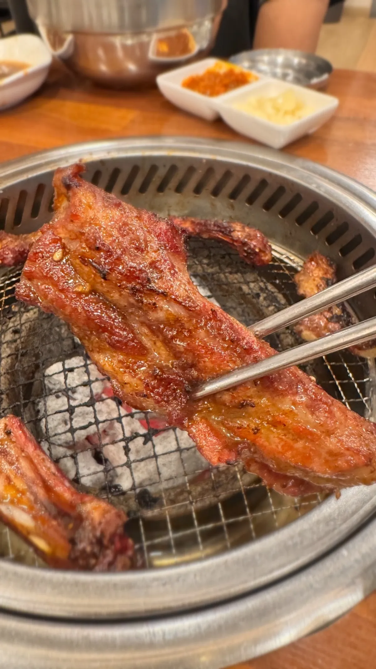 Rib bones grilled crispy at the edge of the grill