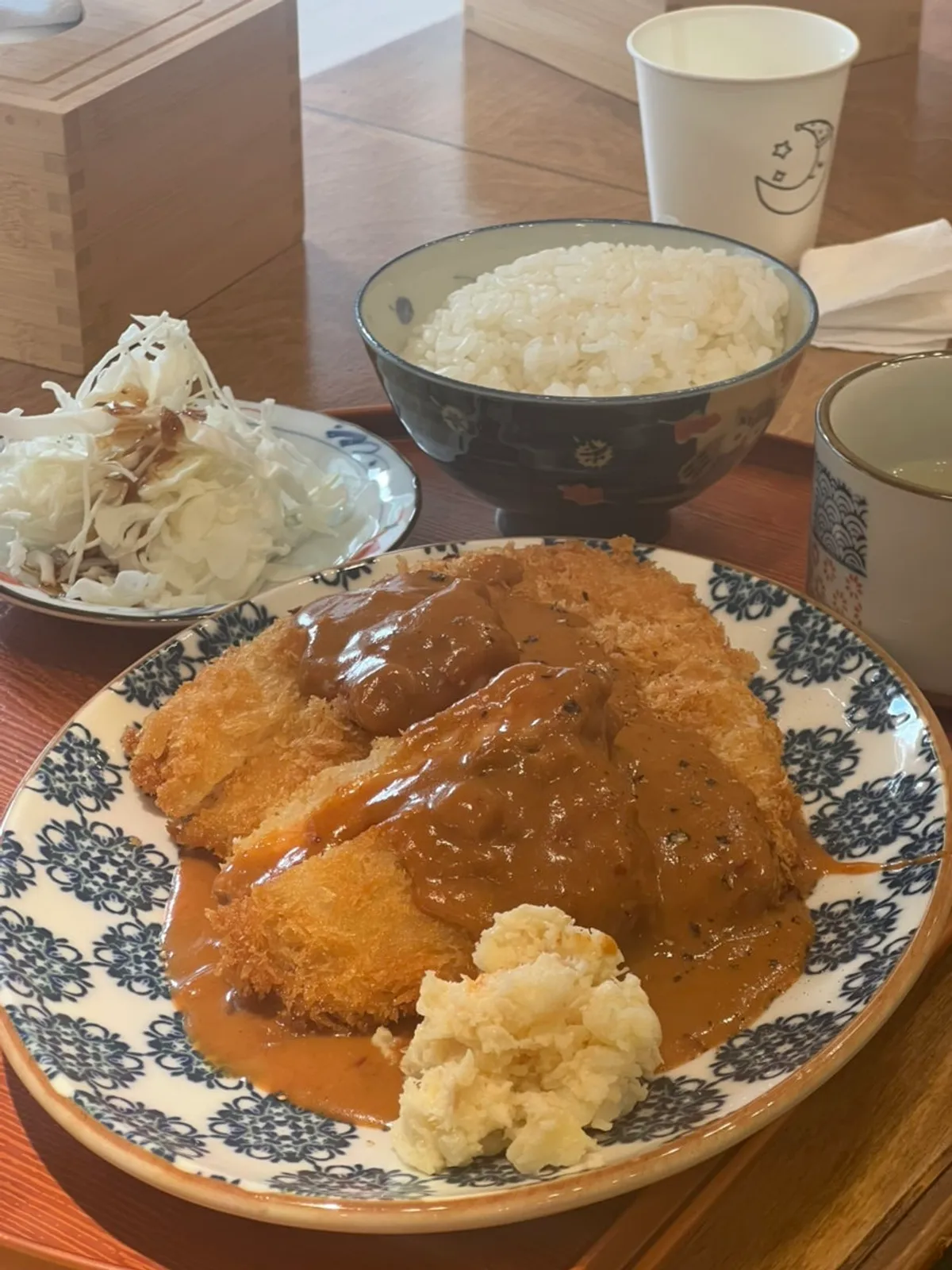 Close-up of Goshi Goshi's basil demi tonkatsu