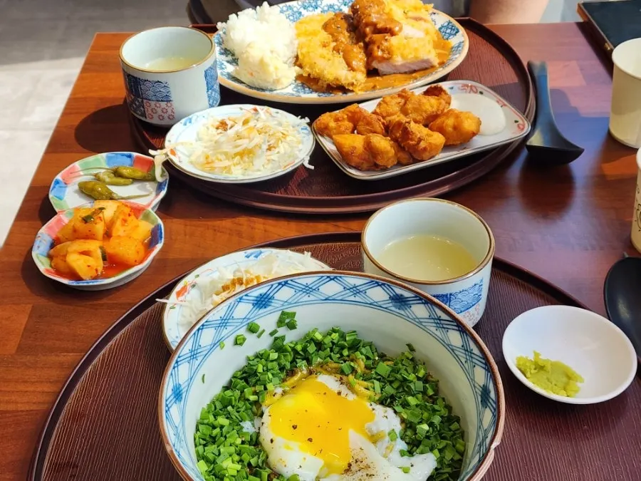 Toowoomba tonkatsu and basil soba laid out together