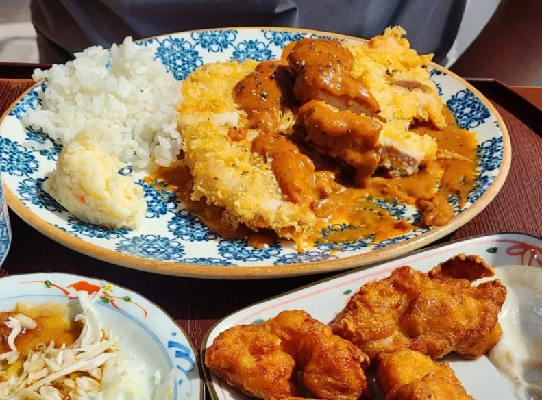 Nearly finished plate of tonkatsu