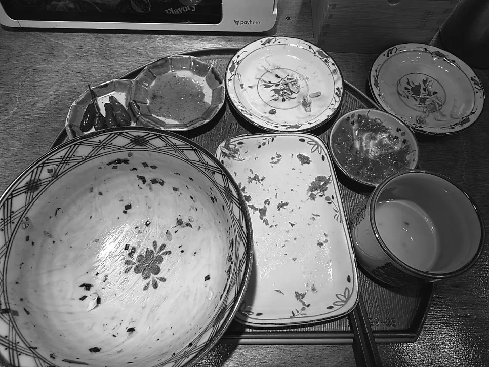 Empty bowls after finishing the yukhoe rice bowl and pork cutlet