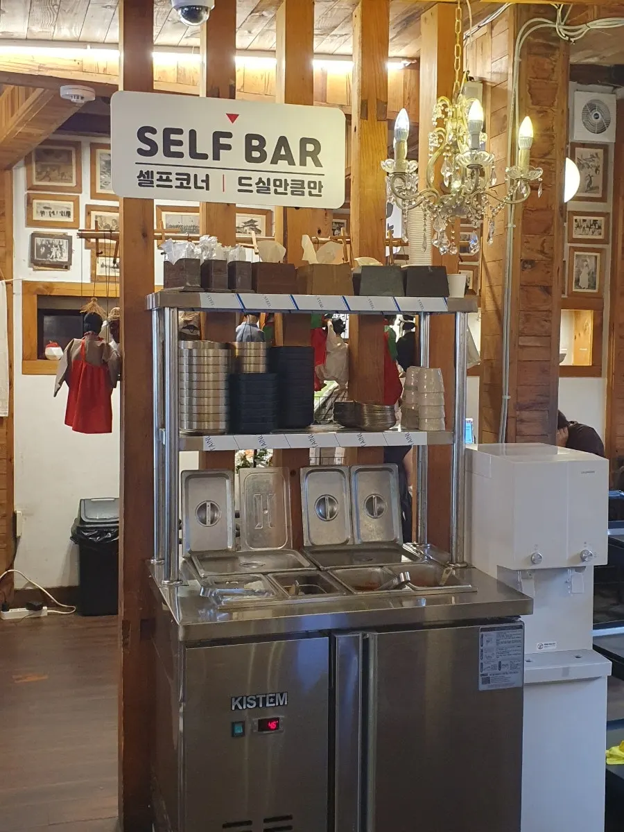 Self-serve side dish bar inside the restaurant