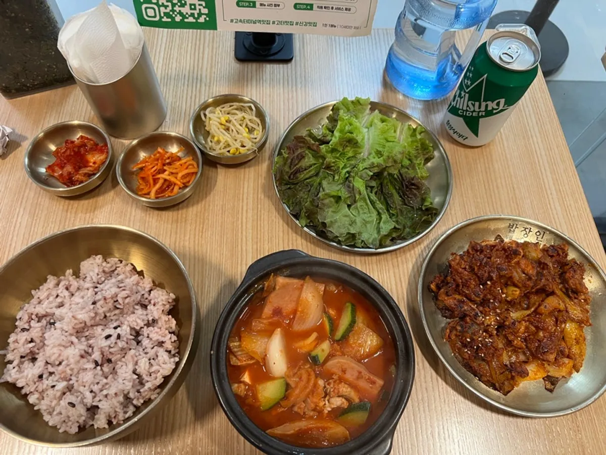 Table setting with Spam stew, bulgogi, and lettuce