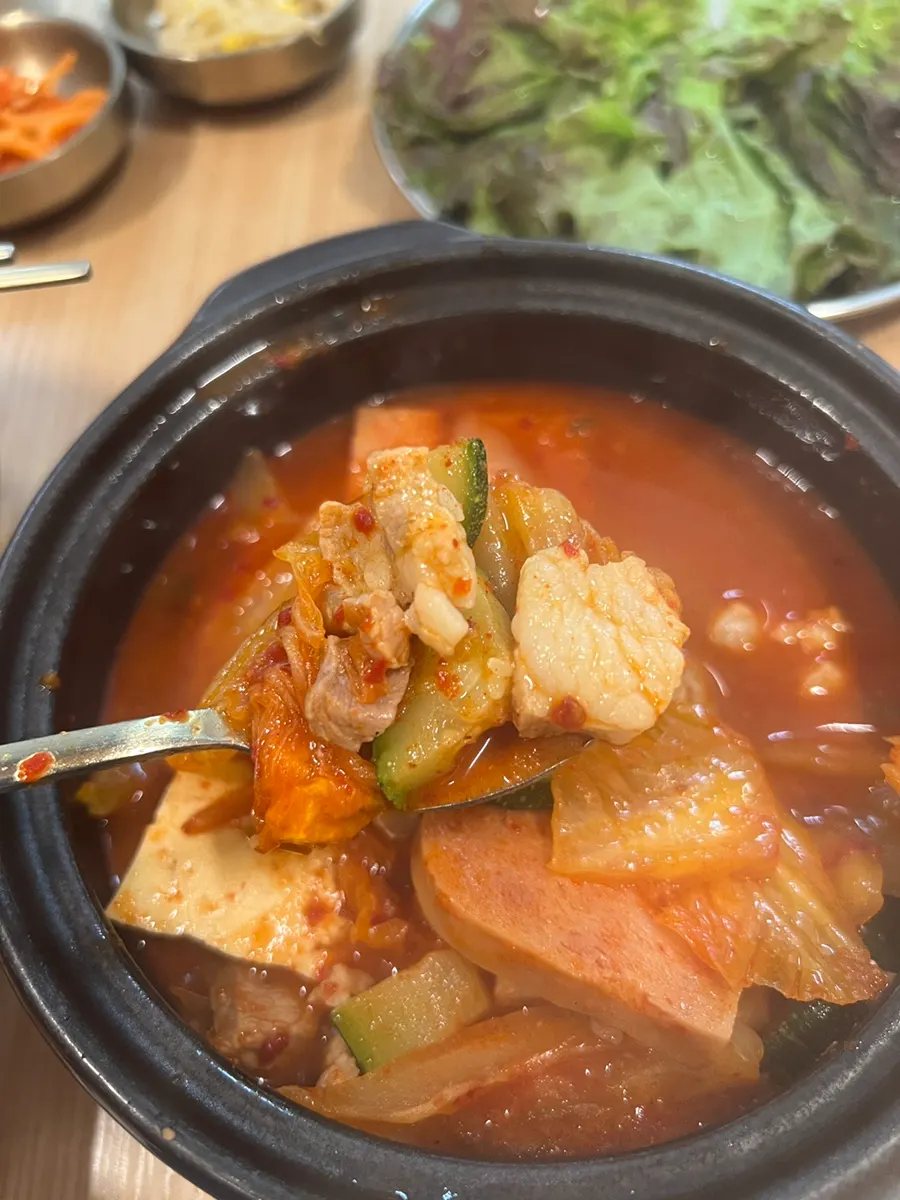 Spam and tofu lifted out of the stew