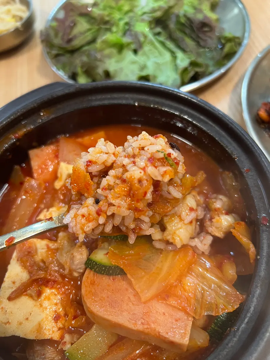 Stew showing small pieces of pork