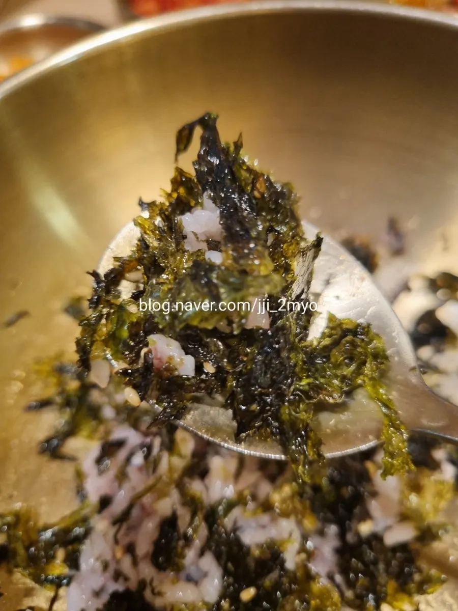 Big bowl of rice with gim flakes mixed in