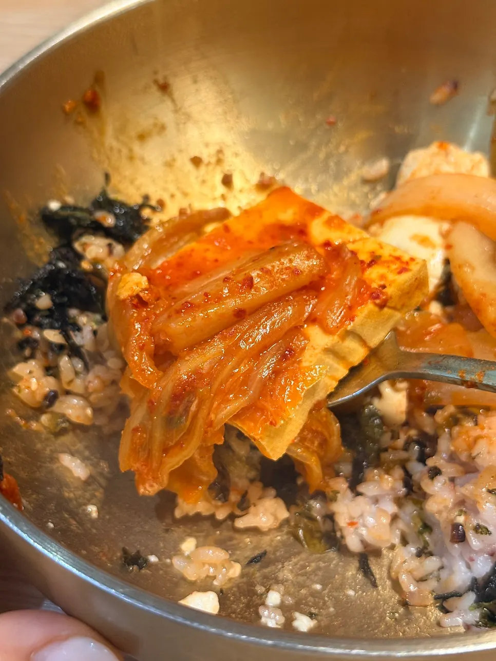 Kimchi stew broth with a bowl of rice