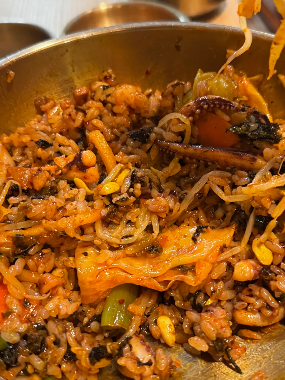 Squid stir-fry rice fully mixed with vegetables